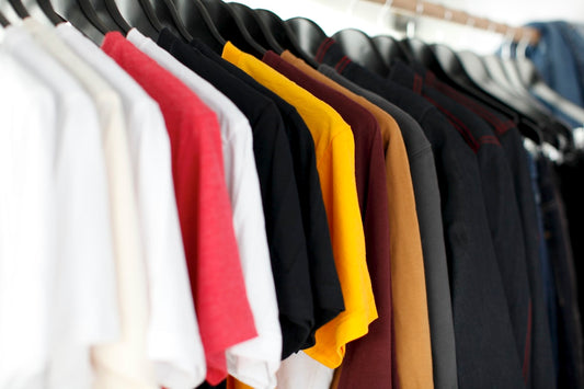 Organised wardrobe with folded clothes, how to remove bobbles from school uniform